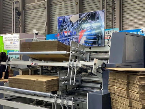 德鋼機械三款設(shè)備亮相全印展，紙箱機械設(shè)備引發(fā)客戶熱切關(guān)注